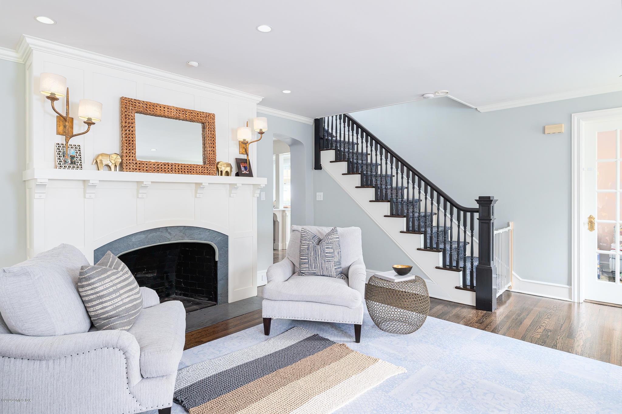 20 Meadow Road Riverside, CT 06878 - Photo 4 of 23 a living room with furniture and a fireplace