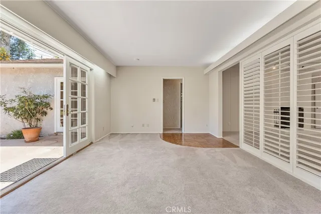 a view of a room with a large window