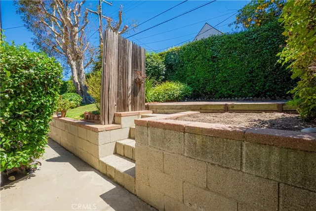 an aerial view of a house with garden