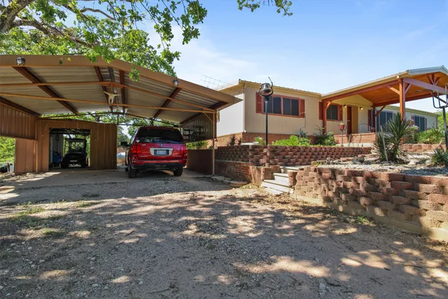 a view of a golf course with a lake view