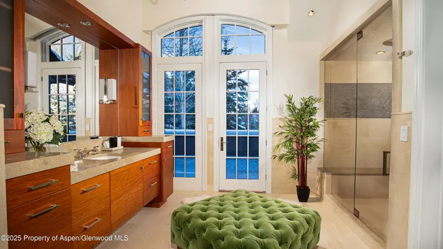 a kitchen with stainless steel appliances granite countertop a stove and a microwave