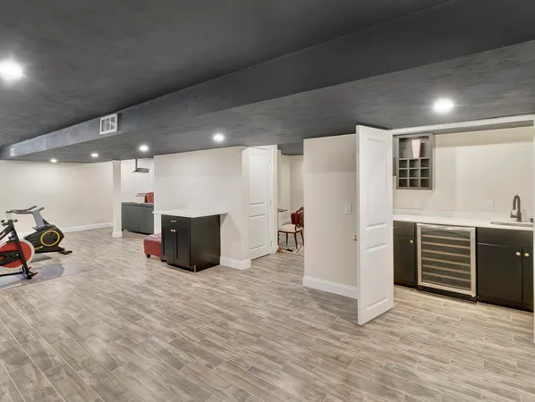 a room with furniture and a flat screen tv