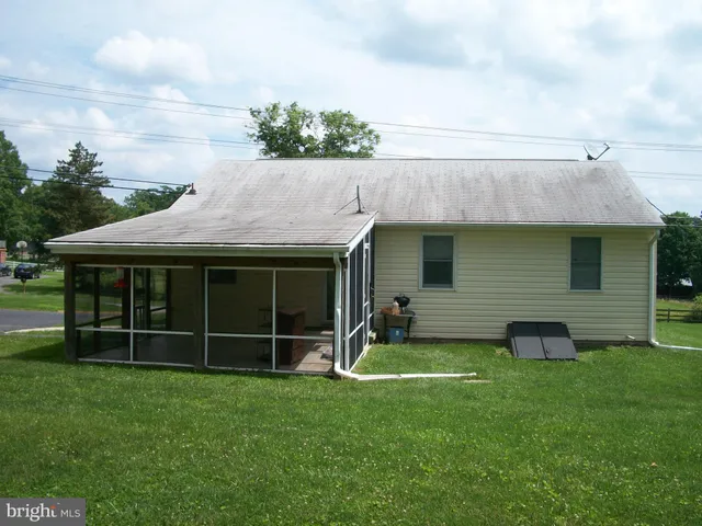 a view of a house with a garden