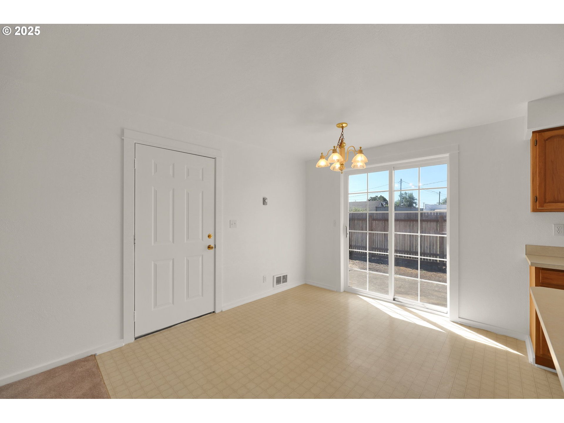 176 19th Street Springfield, OR 97477 - Photo 12 of 35 a view of an empty room with a window