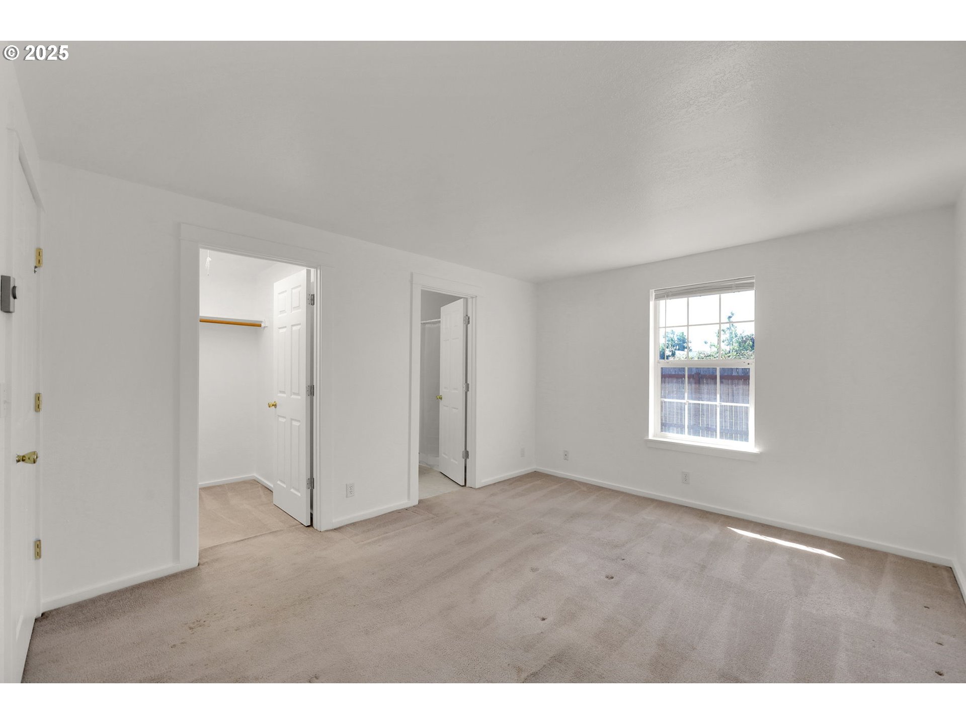 176 19th Street Springfield, OR 97477 - Photo 25 of 35 a view of an empty room with a window