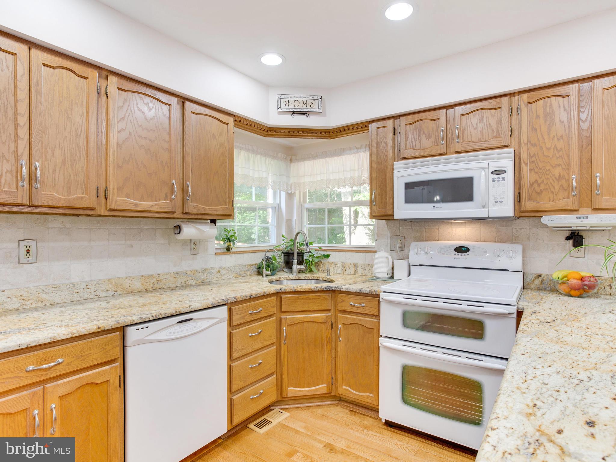 9710 Smith Way Dunkirk, MD 20754 - Photo 15 of 66 Update appliances, granite, and water filtration
