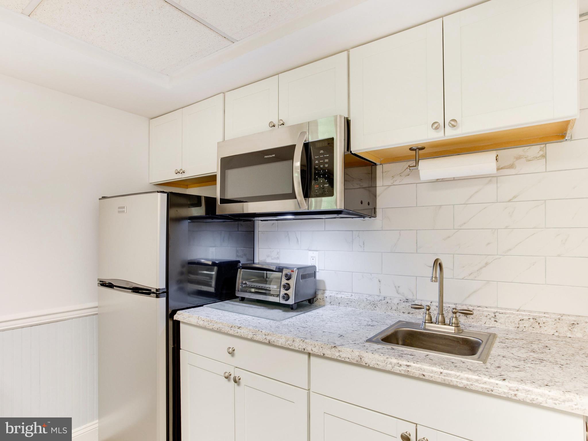 9710 Smith Way Dunkirk, MD 20754 - Photo 45 of 66 Finished Basement - Living area Kitchenette