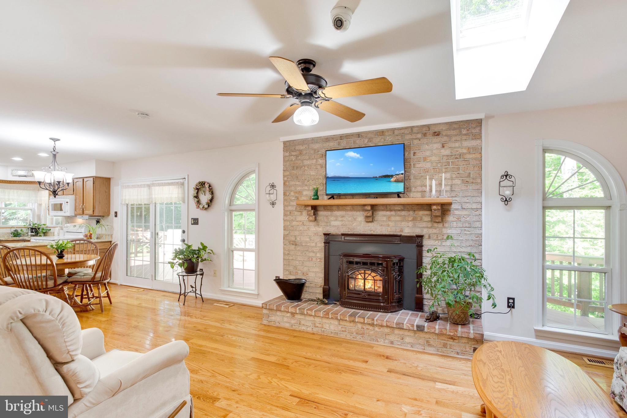 9710 Smith Way Dunkirk, MD 20754 - Photo 9 of 66 Comfortable living room with high end pellet stove