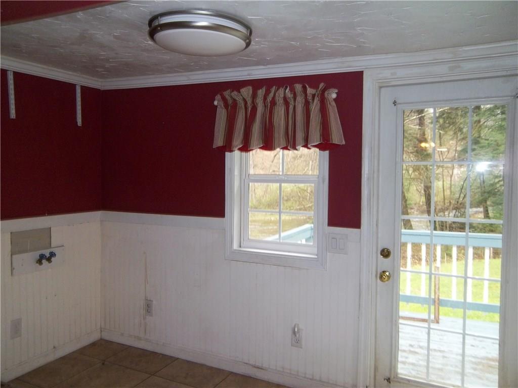 140 State Rte 1034 Templeton, PA 16259 - Photo 8 of 19 Laundry area leads to rear deck