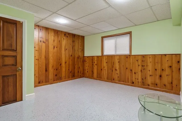 a bedroom with a bed and furniture