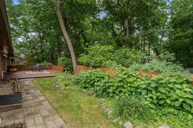a view of a backyard with a garden