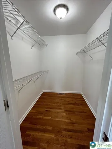 a view of a room with racks on the wall