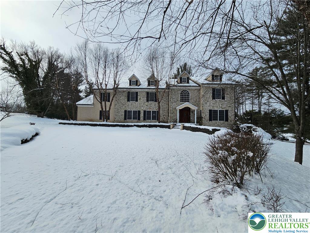 1 Dunminning Road Newtown Square, PA 19073 - Photo 1 of 30 a view of a house with a snow in the yard