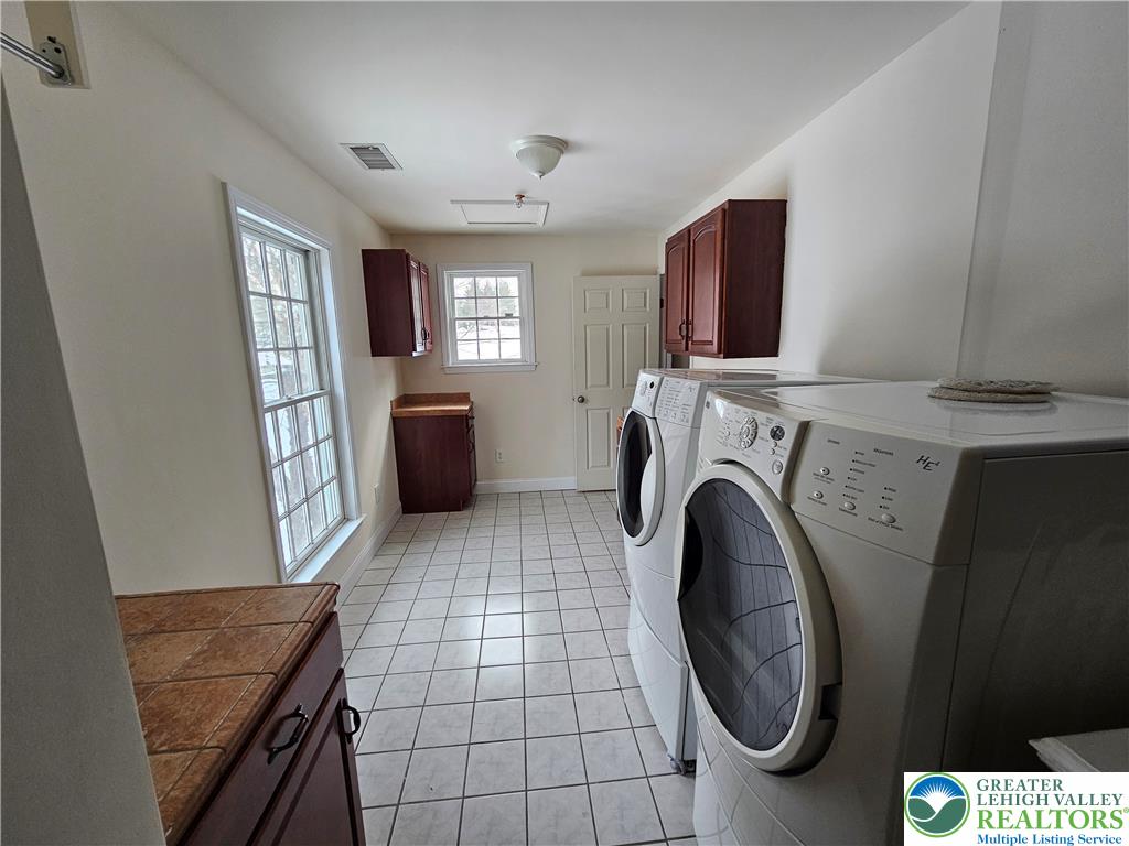 1 Dunminning Road Newtown Square, PA 19073 - Photo 20 of 30 a view of livingroom with washer and dryer