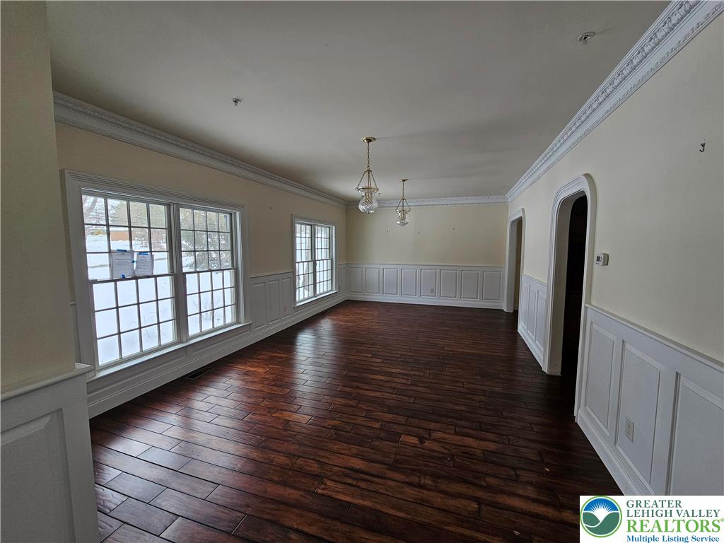 1 Dunminning Road Newtown Square, PA 19073 - Photo 3 of 30 a view of empty room with wooden floor and fan