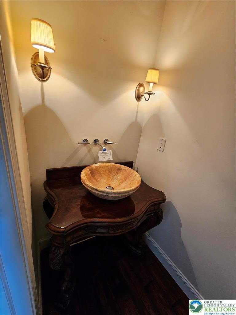 1 Dunminning Road Newtown Square, PA 19073 - Photo 10 of 30 a bathroom with a sink and a mirror