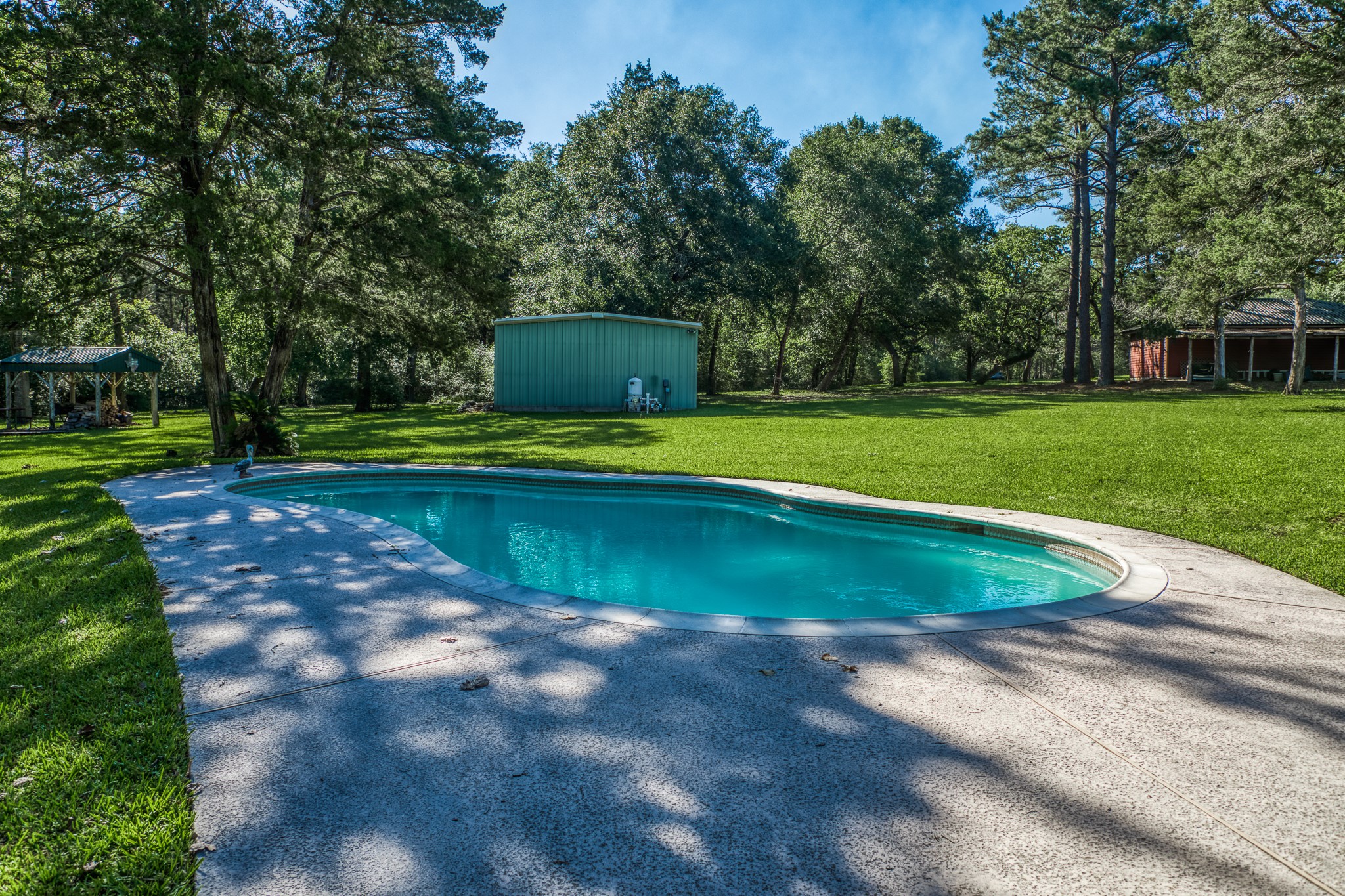 1017 Allen Road Cat Spring, TX 78933 - Photo 27 of 47 a view of a swimming pool with a yard