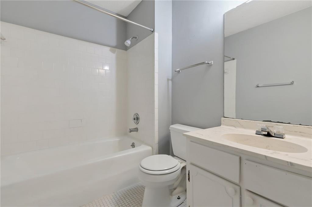 156 Glen Acres Court Decatur, GA 30035 - Photo 12 of 15 a bathroom with a sink toilet and shower