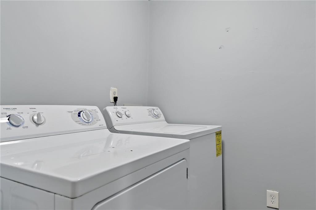 156 Glen Acres Court Decatur, GA 30035 - Photo 14 of 15 a utility room with dryer and washer