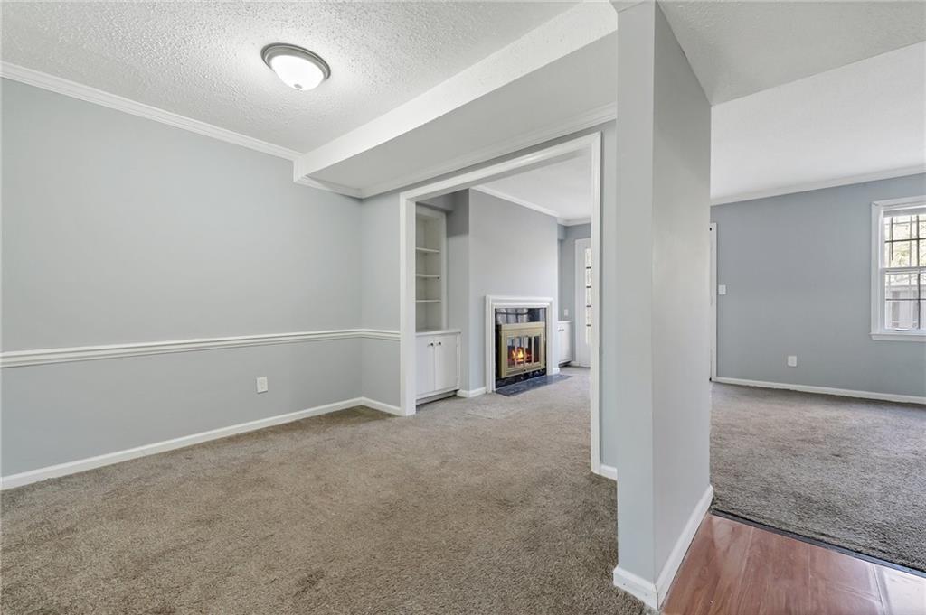 156 Glen Acres Court Decatur, GA 30035 - Photo 5 of 15 an empty room with windows