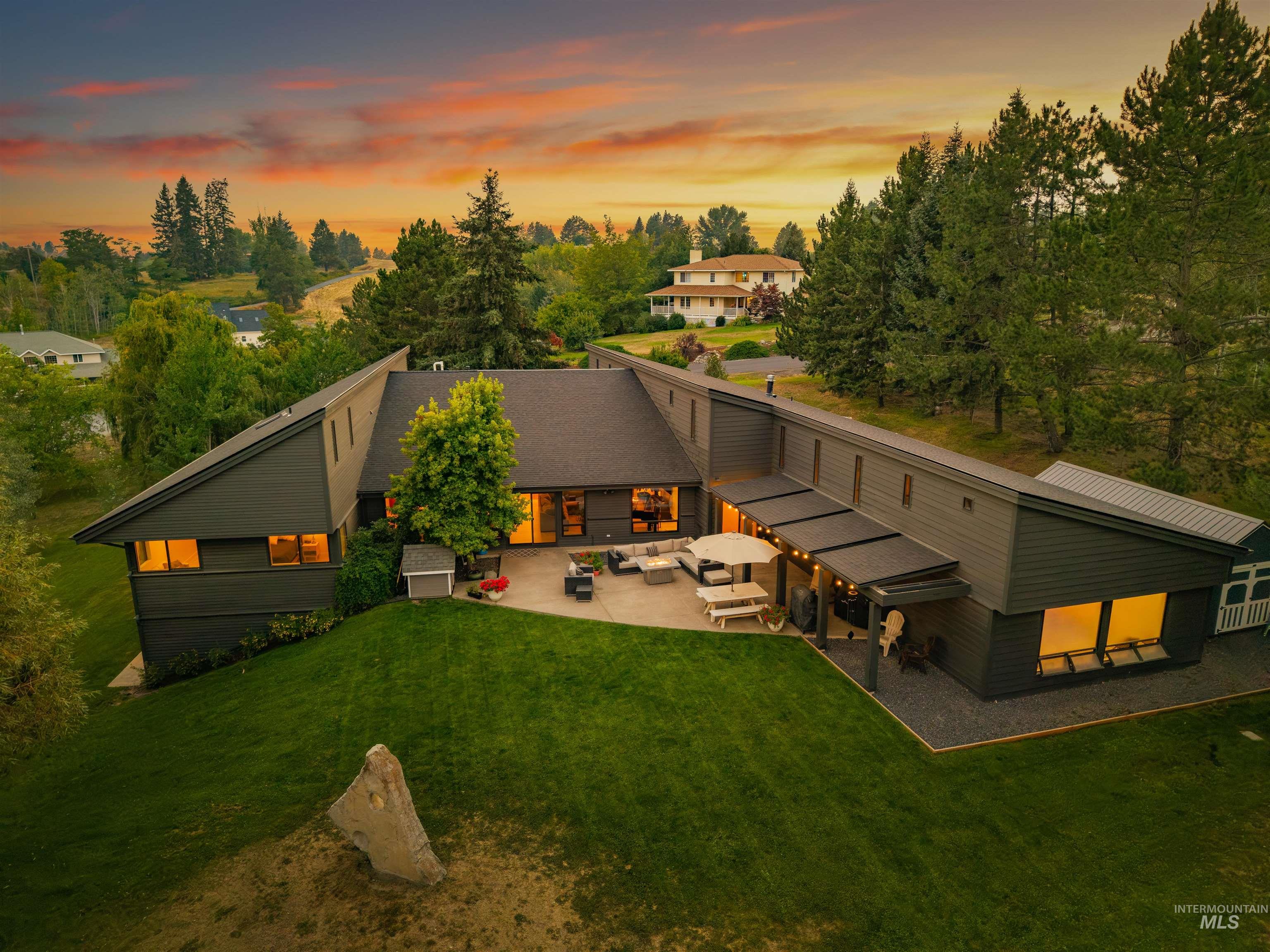 2048 Arborcrest Road Moscow, ID 83843 - Photo 6 of 50 Contemporary dark-toned exterior with multiple windows