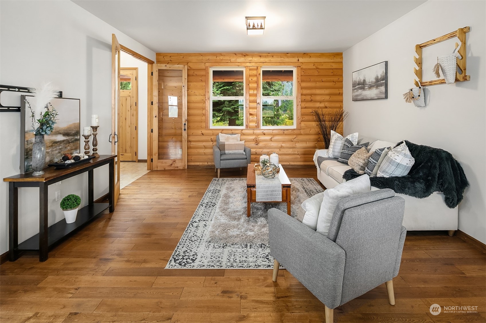 111 Chandler Road Cle Elum, WA 98922 - Photo 17 of 36 a living room with furniture and a fireplace