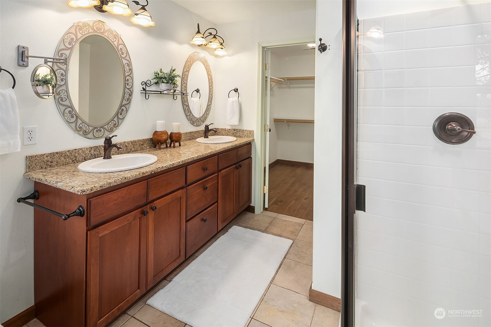 111 Chandler Road Cle Elum, WA 98922 - Photo 30 of 36 a bathroom with a double vanity sink mirror and shower