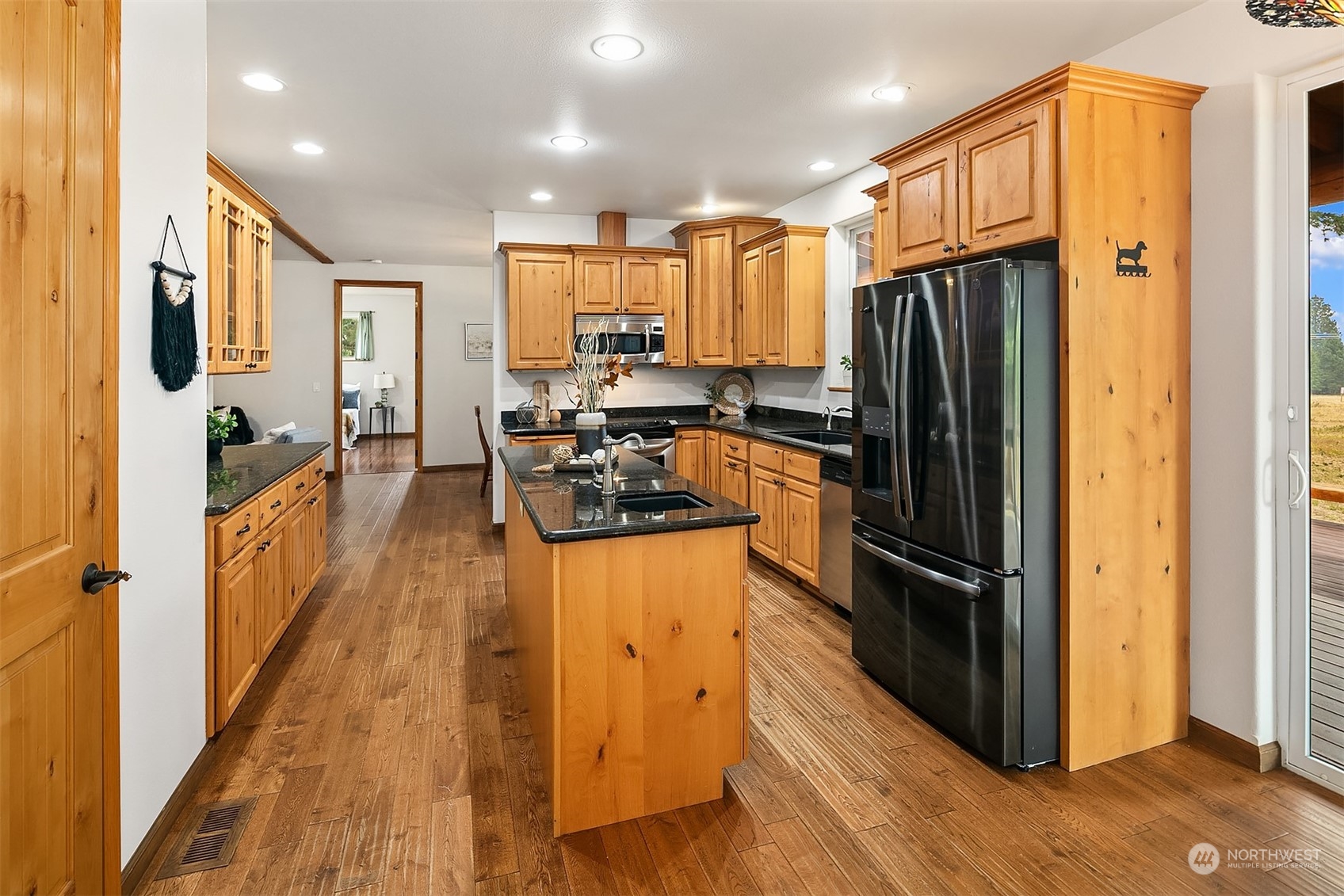 111 Chandler Road Cle Elum, WA 98922 - Photo 10 of 36 a kitchen with stainless steel appliances granite countertop a refrigerator and a stove top oven