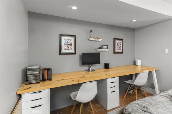 a view of a workspace with furniture