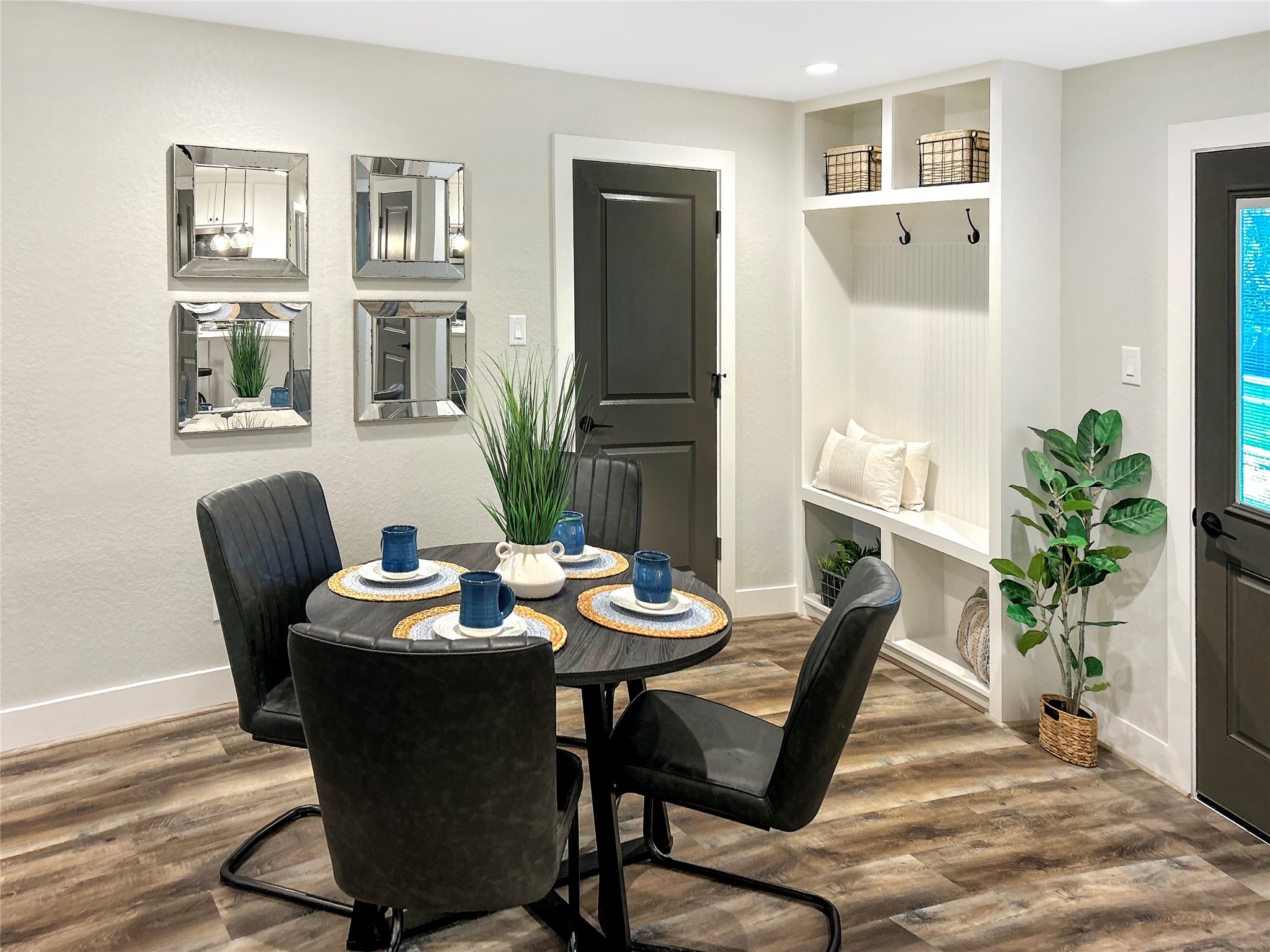 701 Cannan Drive Angleton, TX 77515 - Photo 8 of 25 Dining Area and Mud Bench