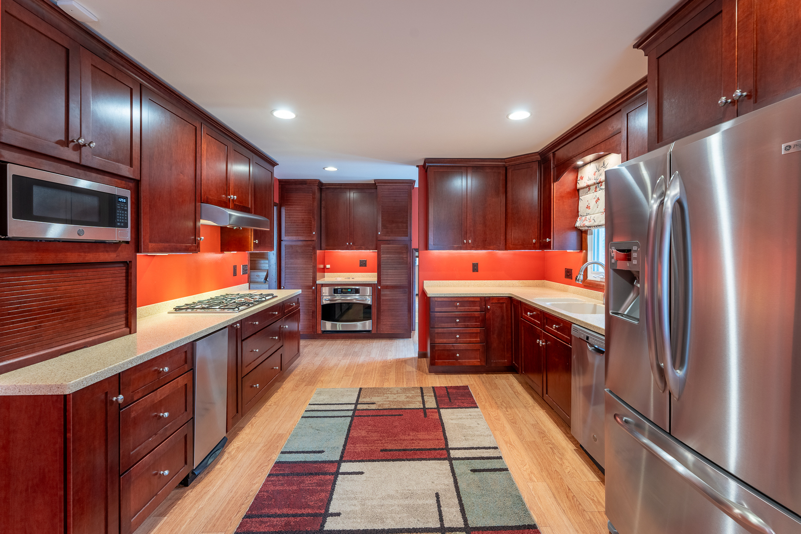 212 Kane Drive Herrin, IL 62948 - Photo 11 of 44 a large kitchen with stainless steel appliances kitchen island granite countertop a refrigerator and a stove