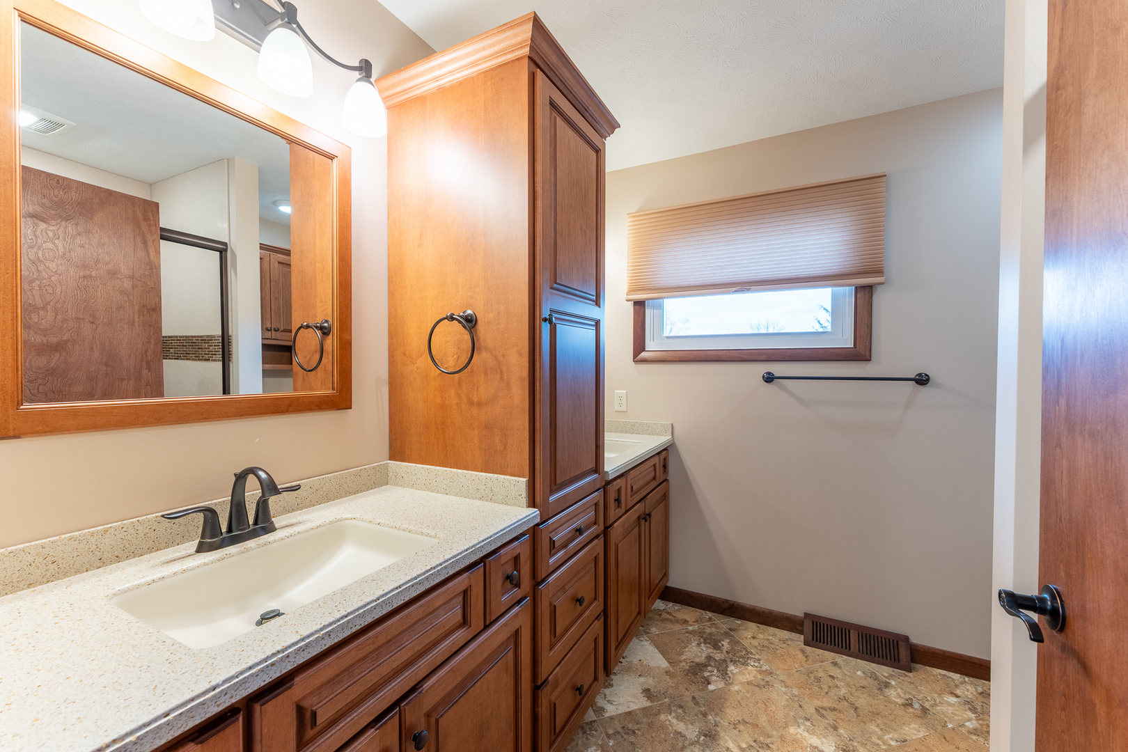 212 Kane Drive Herrin, IL 62948 - Photo 19 of 44 a bathroom with a sink and a mirror