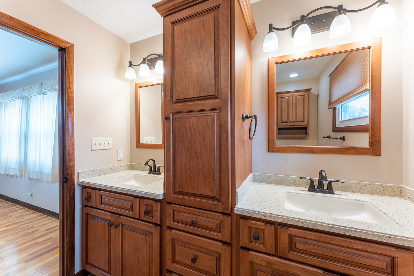 212 Kane Drive Herrin, IL 62948 - Photo 20 of 44 a bathroom with a sink and a mirror