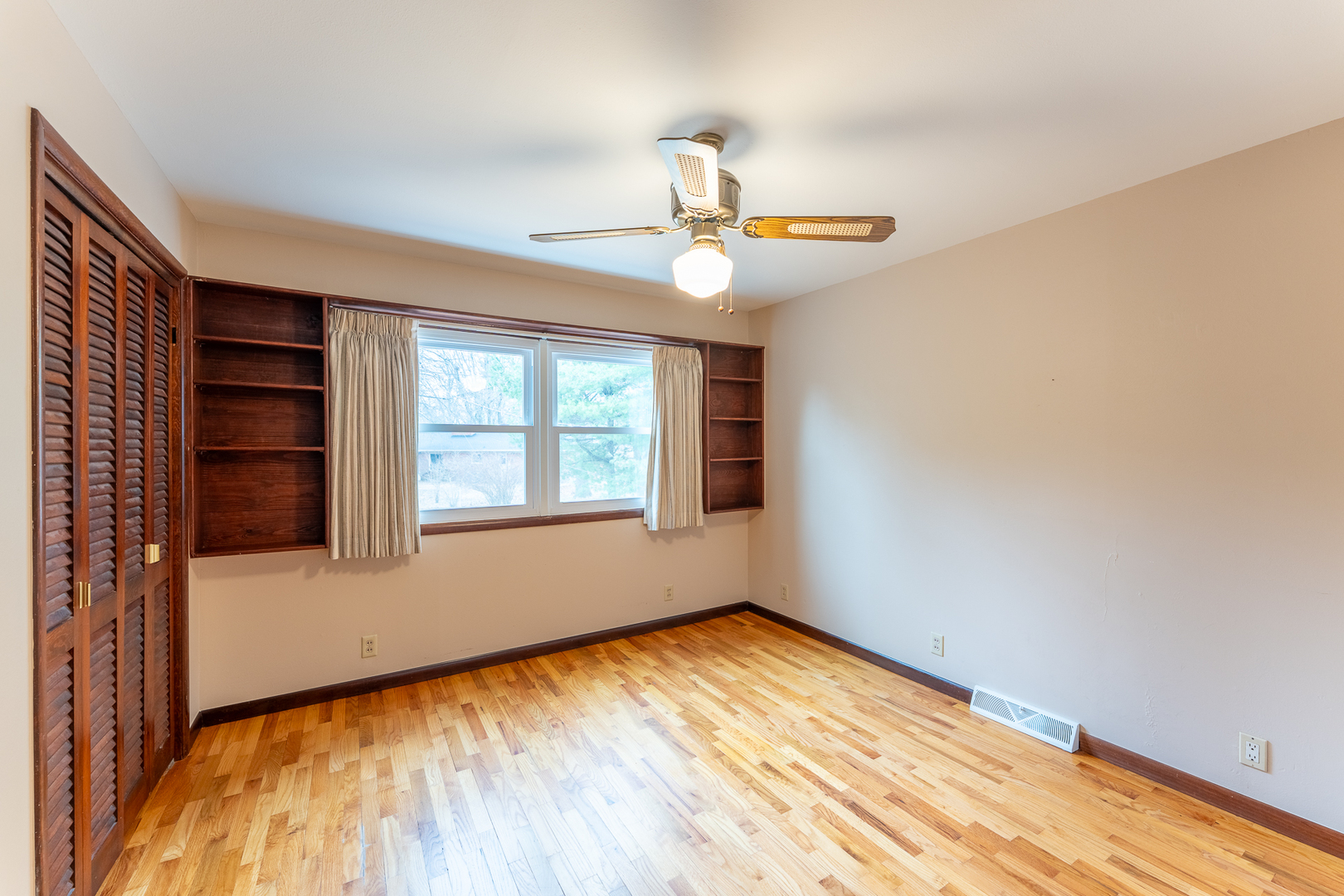 212 Kane Drive Herrin, IL 62948 - Photo 23 of 44 wooden floor in an empty room with a window