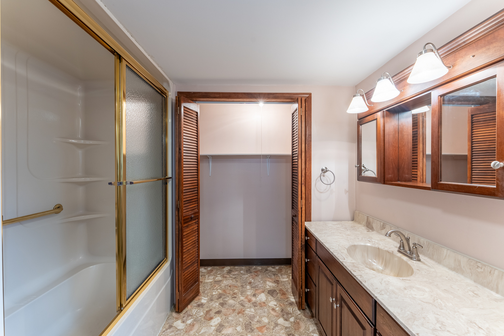 212 Kane Drive Herrin, IL 62948 - Photo 32 of 44 a bathroom with a granite countertop sink mirror and shower
