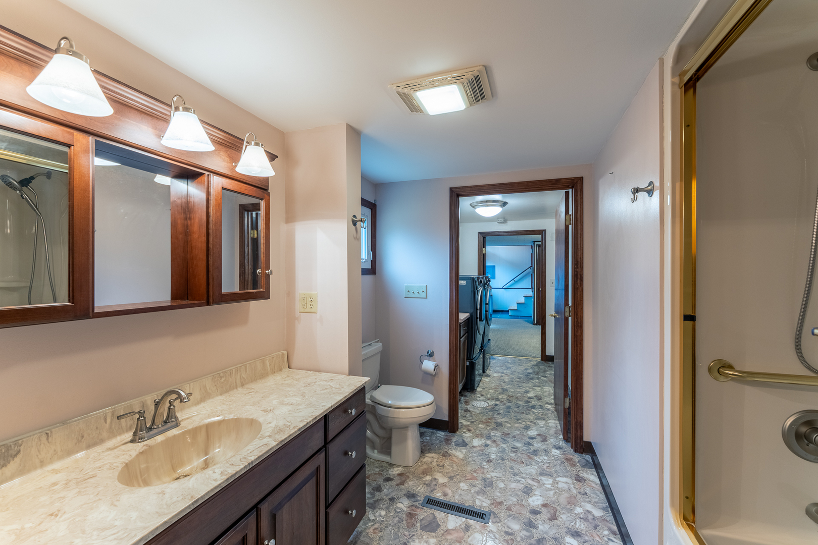 212 Kane Drive Herrin, IL 62948 - Photo 33 of 44 a bathroom with a sink a toilet and shower a mirror