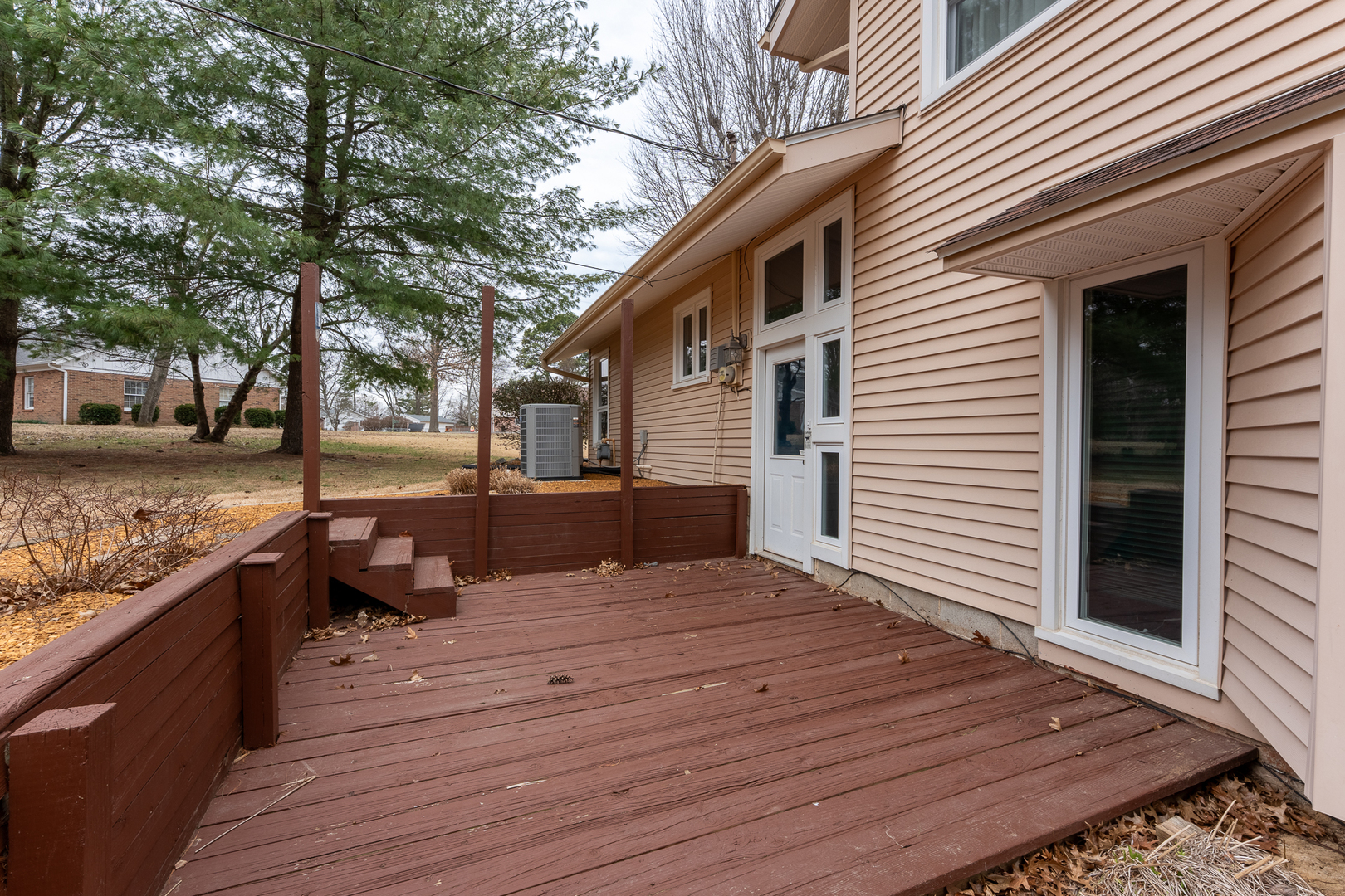 212 Kane Drive Herrin, IL 62948 - Photo 39 of 44 a view of a roof deck with wooden floor and fence