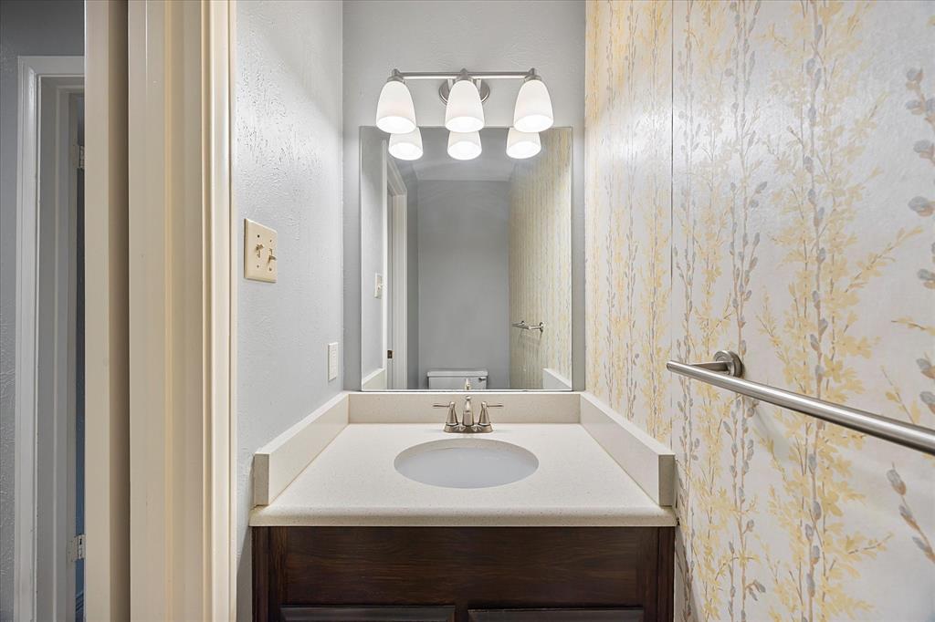 2733 Biloxi Lane Mesquite, TX 75150 - Photo 16 of 28 a bathroom with a sink and a mirror