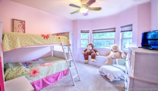 674 Red Fern Road Crestview, FL 32536 - Photo 12 of 23 a bedroom with furniture and a large window