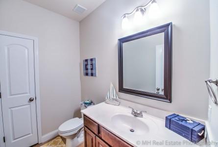 674 Red Fern Road Crestview, FL 32536 - Photo 13 of 23 a bathroom with a sink vanity mirror and toilet