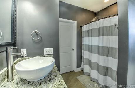 674 Red Fern Road Crestview, FL 32536 - Photo 17 of 23 a bathroom with a sink and a mirror