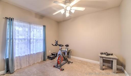 674 Red Fern Road Crestview, FL 32536 - Photo 9 of 23 a view of a room with gym equipment