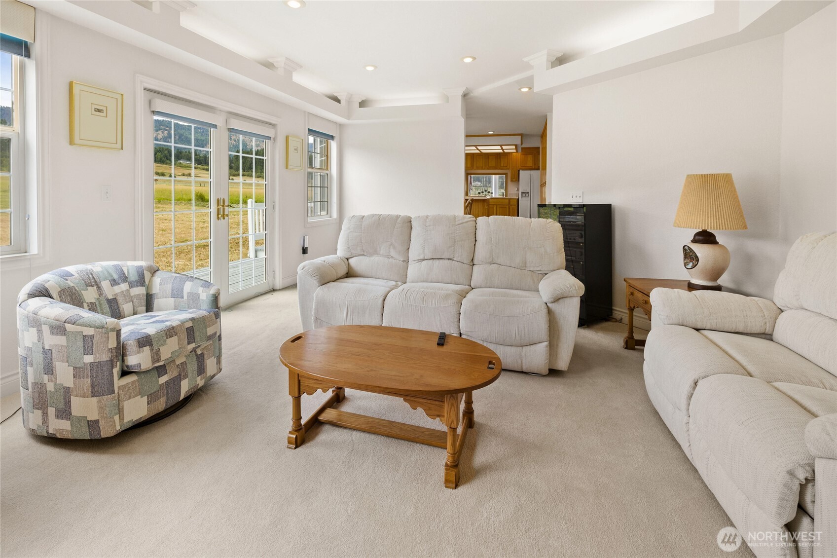 6280 Lower Peoh Point Road Cle Elum, WA 98922 - Photo 15 of 38 a living room with furniture and a large window
