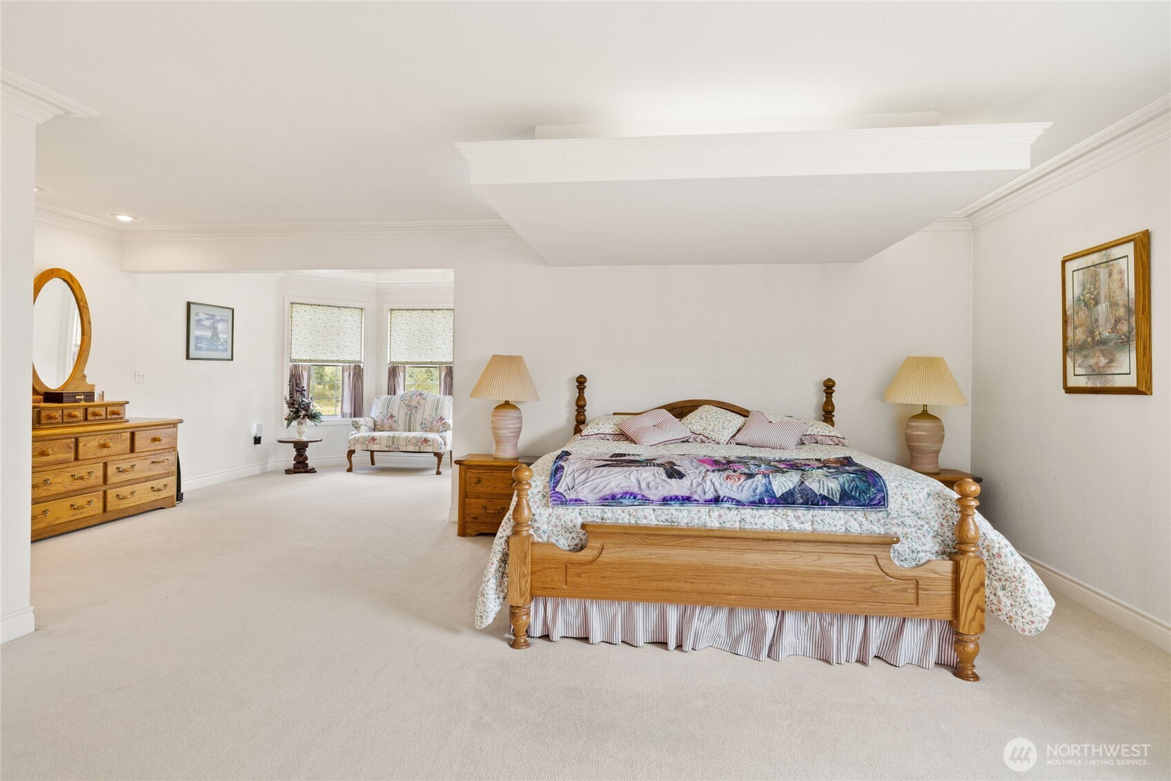 6280 Lower Peoh Point Road Cle Elum, WA 98922 - Photo 20 of 38 a spacious bedroom with bed and a table