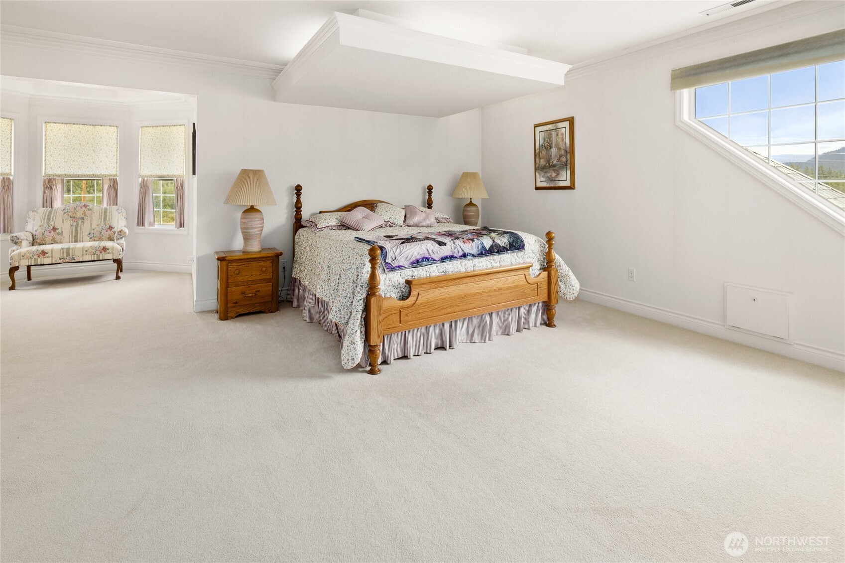 6280 Lower Peoh Point Road Cle Elum, WA 98922 - Photo 24 of 38 a bedroom with furniture and a large window