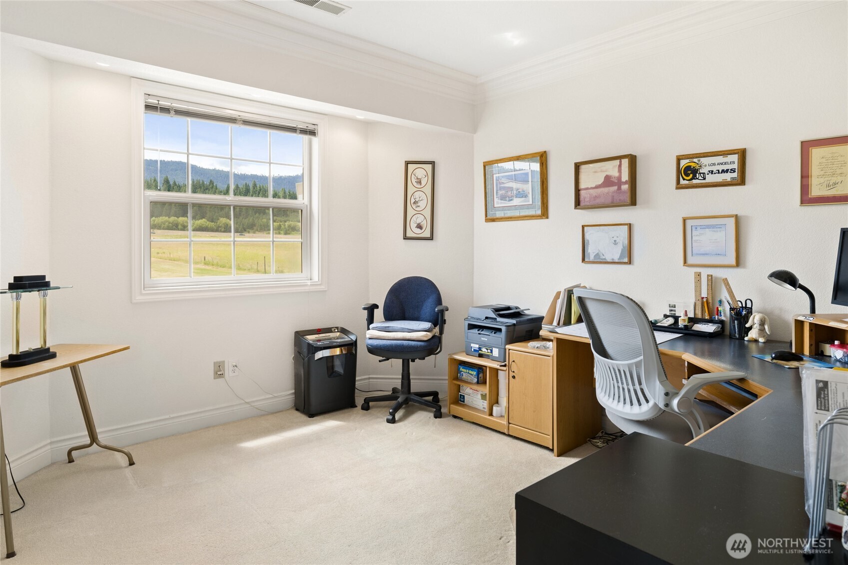 6280 Lower Peoh Point Road Cle Elum, WA 98922 - Photo 29 of 38 a work room with furniture a rug and a window
