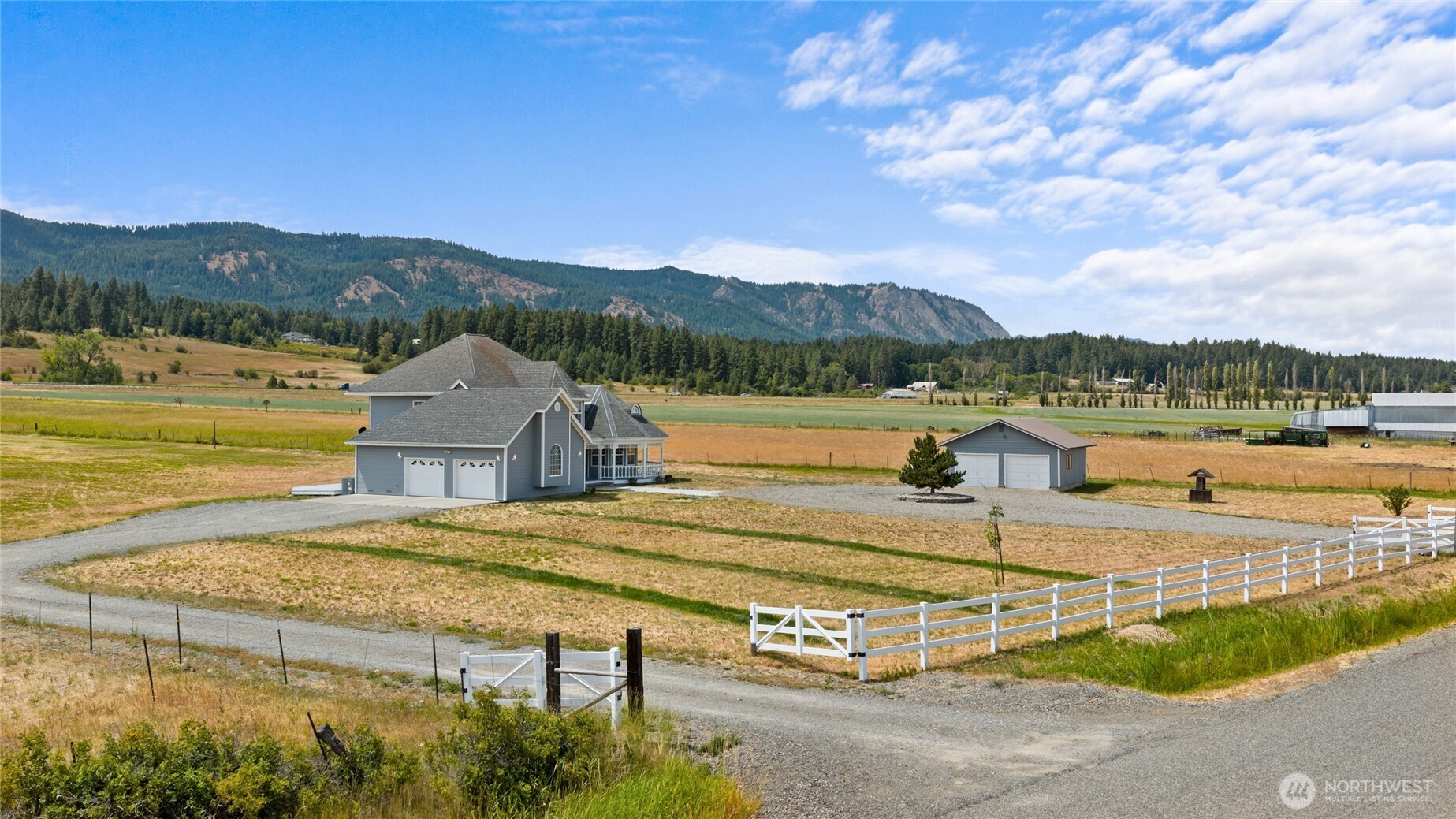 6280 Lower Peoh Point Road Cle Elum, WA 98922 - Photo 31 of 38 a view of a lake with a mountain in the background