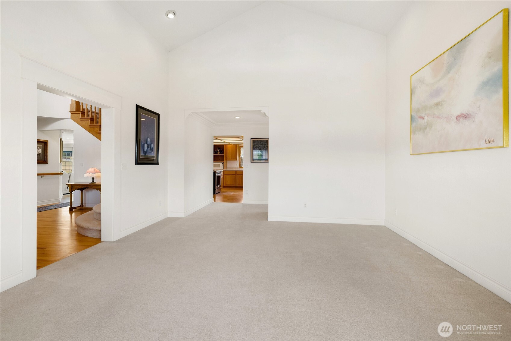 6280 Lower Peoh Point Road Cle Elum, WA 98922 - Photo 5 of 38 a view of a big room with wooden floor and windows