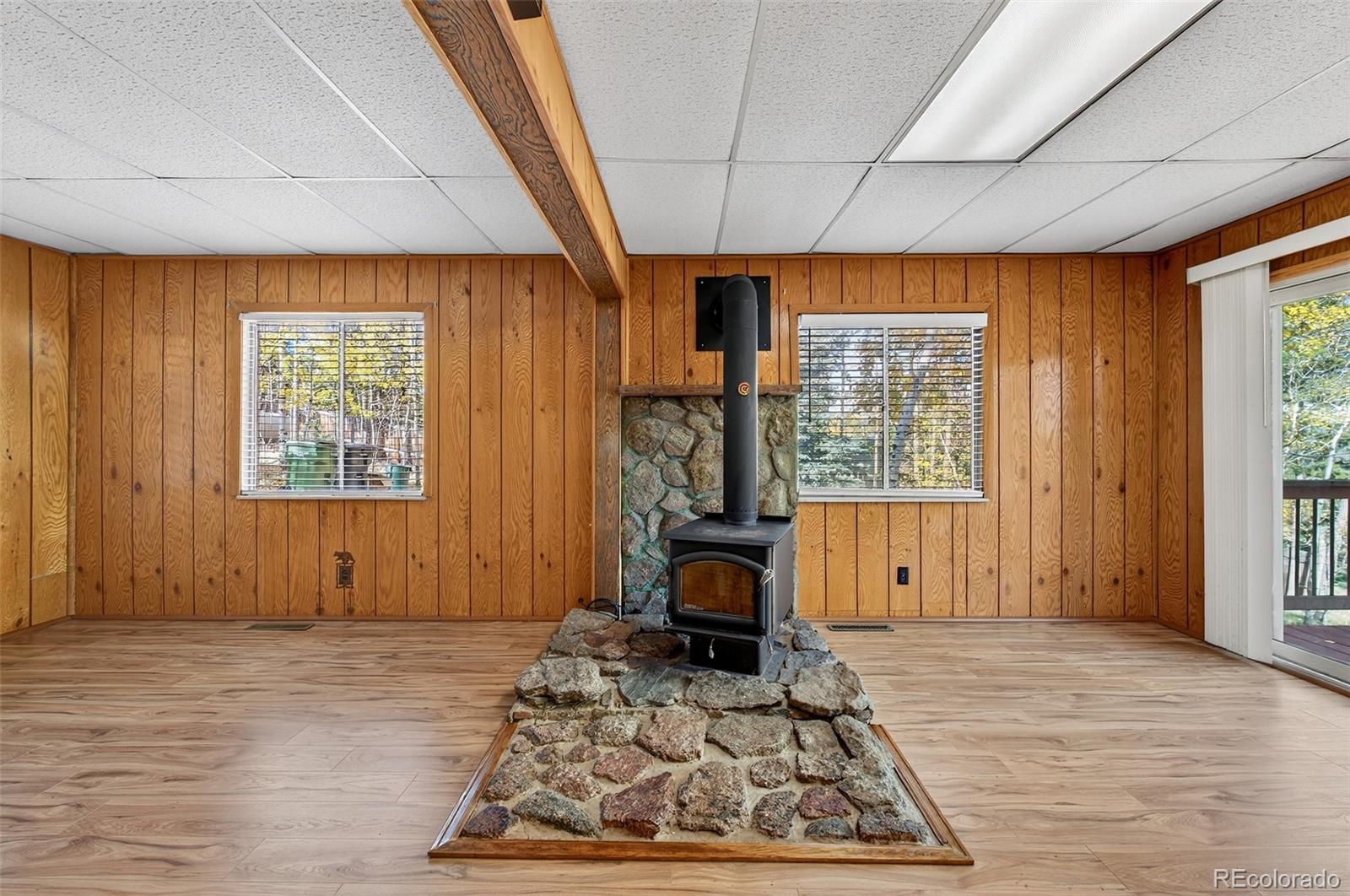 20341 Maxwell Drive Morrison, CO 80465 - Photo 11 of 47 an empty room with furniture and a window