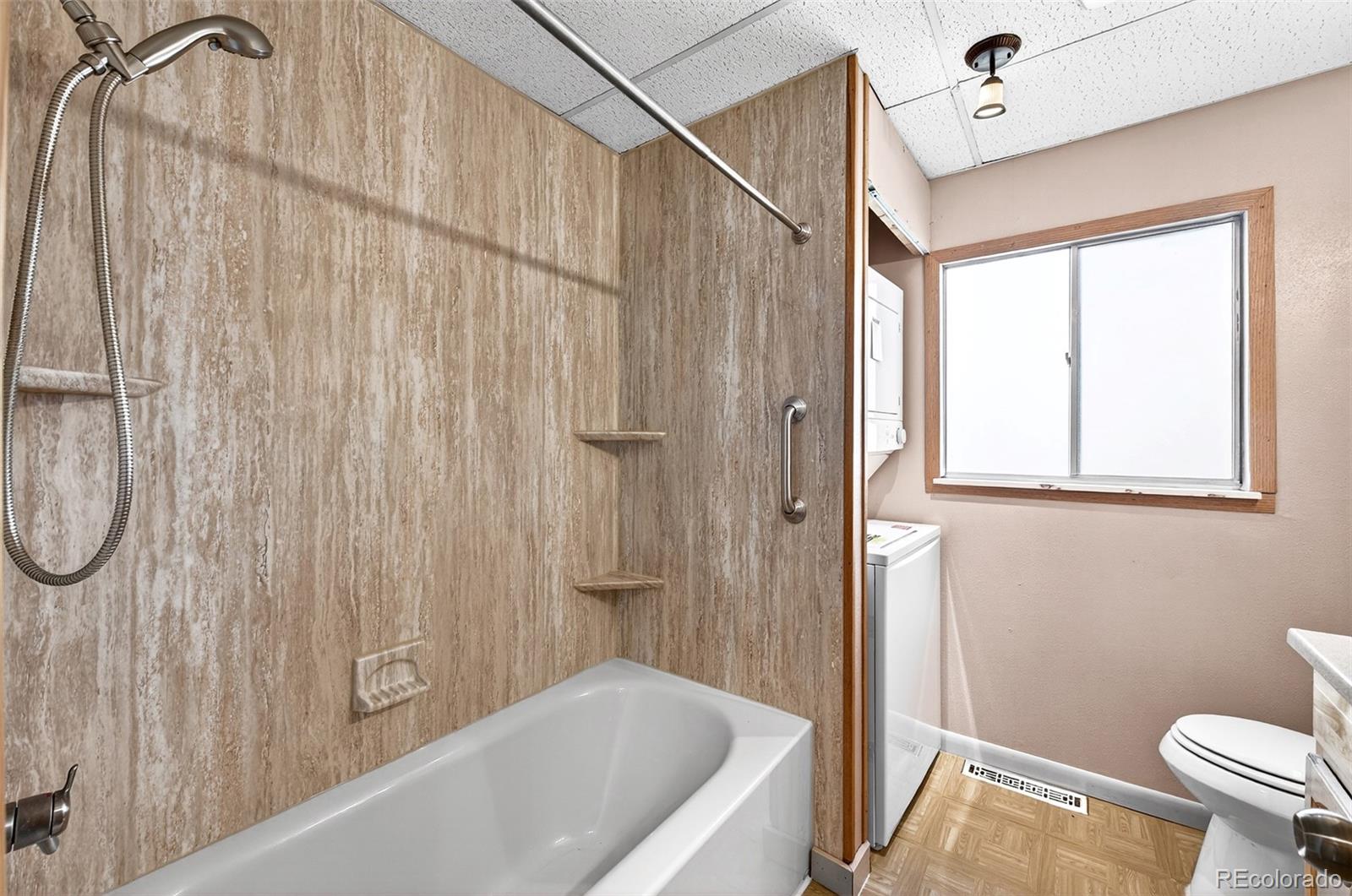 20341 Maxwell Drive Morrison, CO 80465 - Photo 22 of 47 a bathroom with a sink a toilet and shower